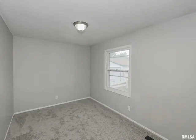 an empty room with closet
