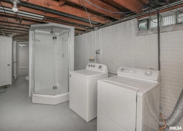 a bathroom with a sink toilet and a mirror