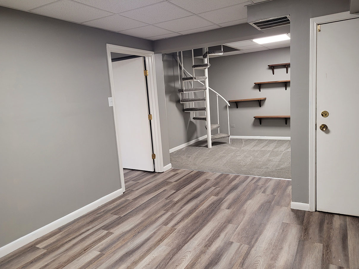 2820 Dundee Road, Unit 2B Northbrook, IL 60062 - Photo 11 of 16 a view of empty room with wooden floor and stairs