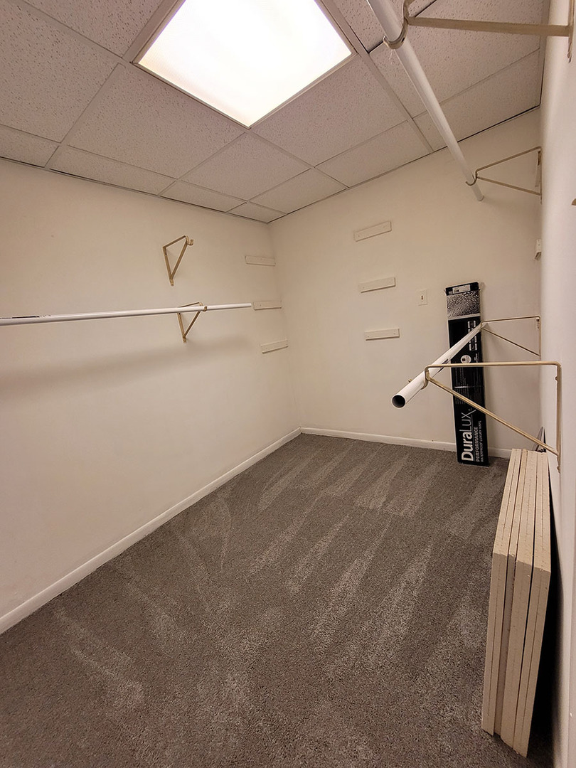 2820 Dundee Road, Unit 2B Northbrook, IL 60062 - Photo 15 of 16 a view of a room with racks on the wall