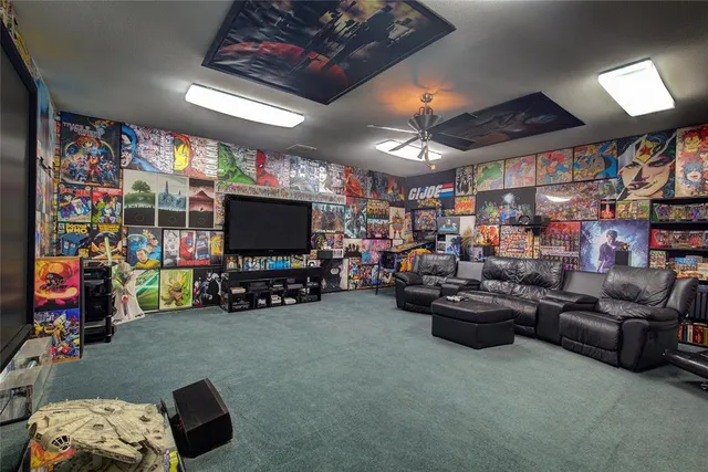 a living room with lots of furniture and a flat screen tv