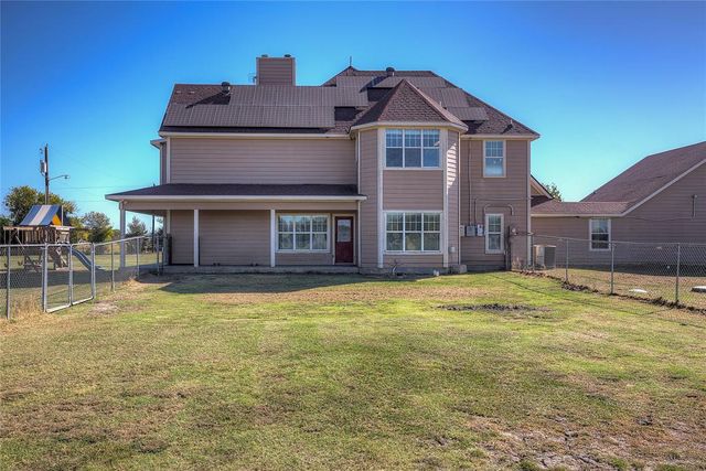 a view of a house with a swimming pool
