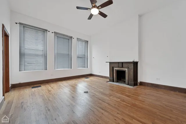 a balcony with wooden floor