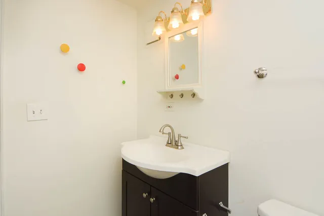 a utility room with dryer washer and other items
