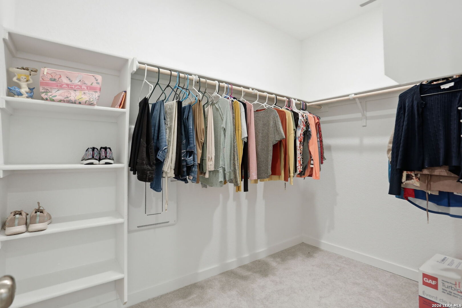 1712 Pahmeyer Path New Braunfels, TX 78130 - Photo 12 of 18 a view of walk in closet with clothes and shoes