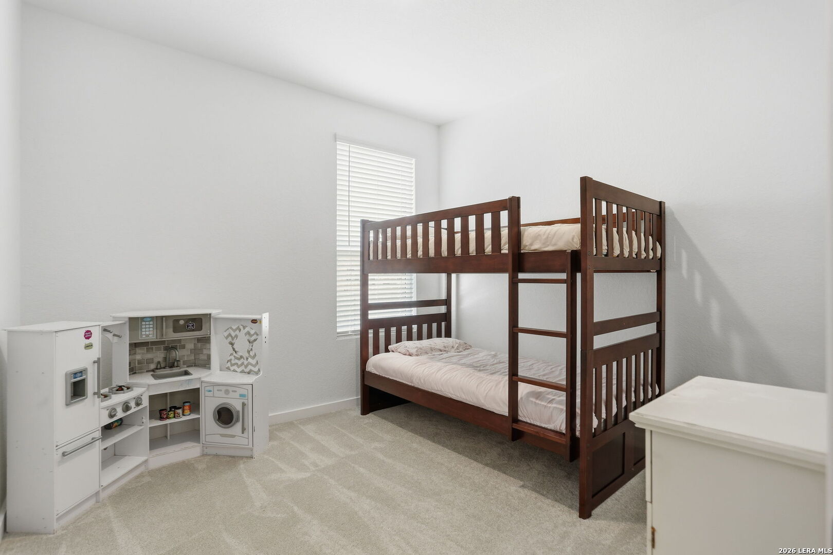 1712 Pahmeyer Path New Braunfels, TX 78130 - Photo 13 of 18 a bedroom with furniture and a window