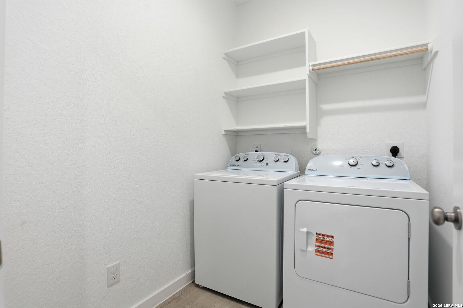 1712 Pahmeyer Path New Braunfels, TX 78130 - Photo 16 of 18 a utility room with dryer and washer