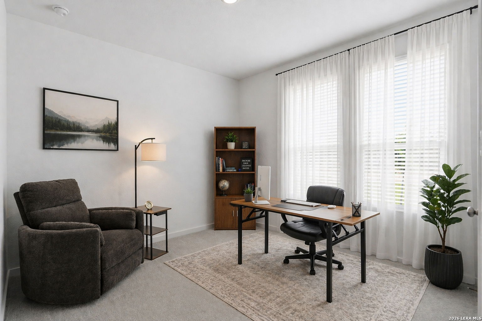 1712 Pahmeyer Path New Braunfels, TX 78130 - Photo 3 of 18 a work room with furniture and a window
