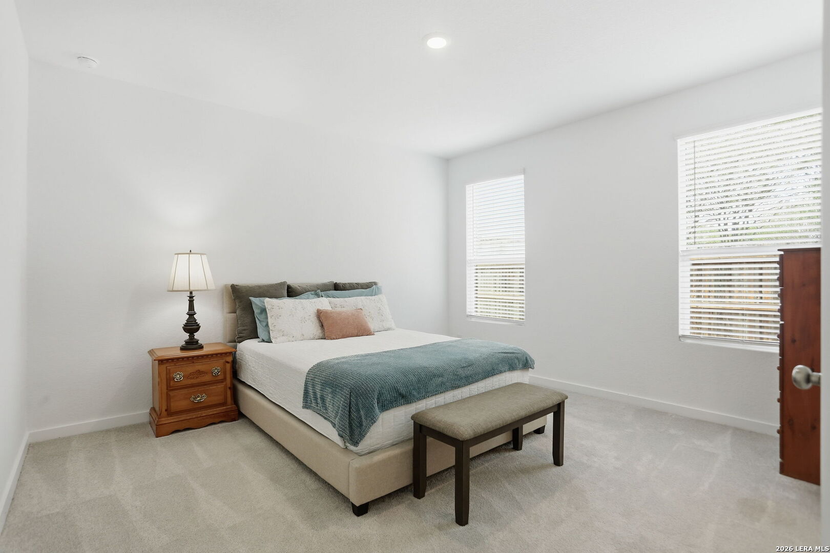 1712 Pahmeyer Path New Braunfels, TX 78130 - Photo 8 of 18 a bedroom with a bed and a window