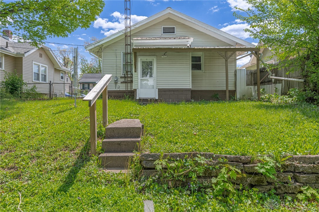 2118 Hillside Avenue Springfield, OH 45503 - Photo 20 of 28 This charming home offers a welcoming facade with a lush green yard.