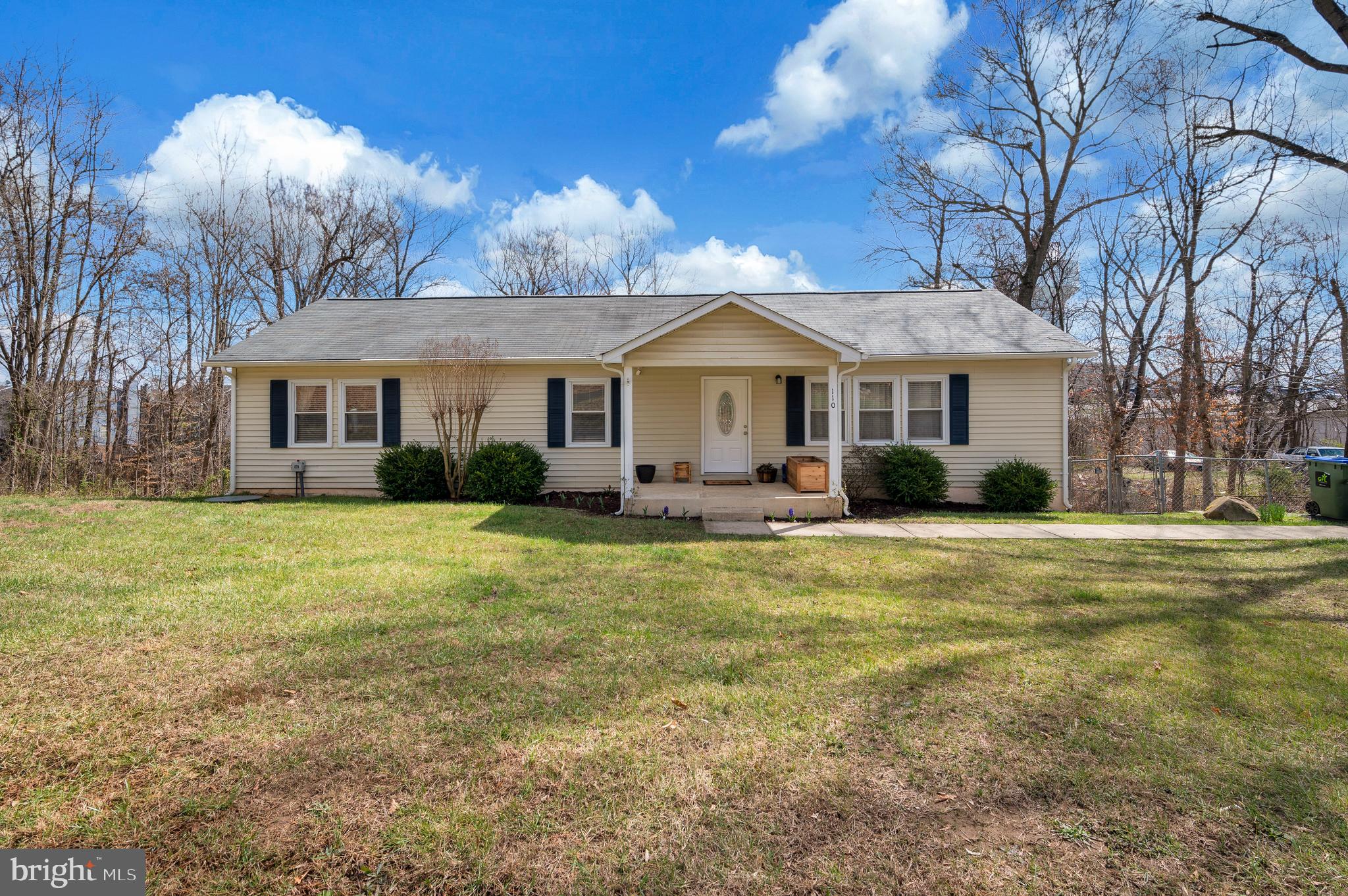 110 Doc Stone Road Stafford, VA 22556 - Photo 1 of 39 a front view of a house with a garden