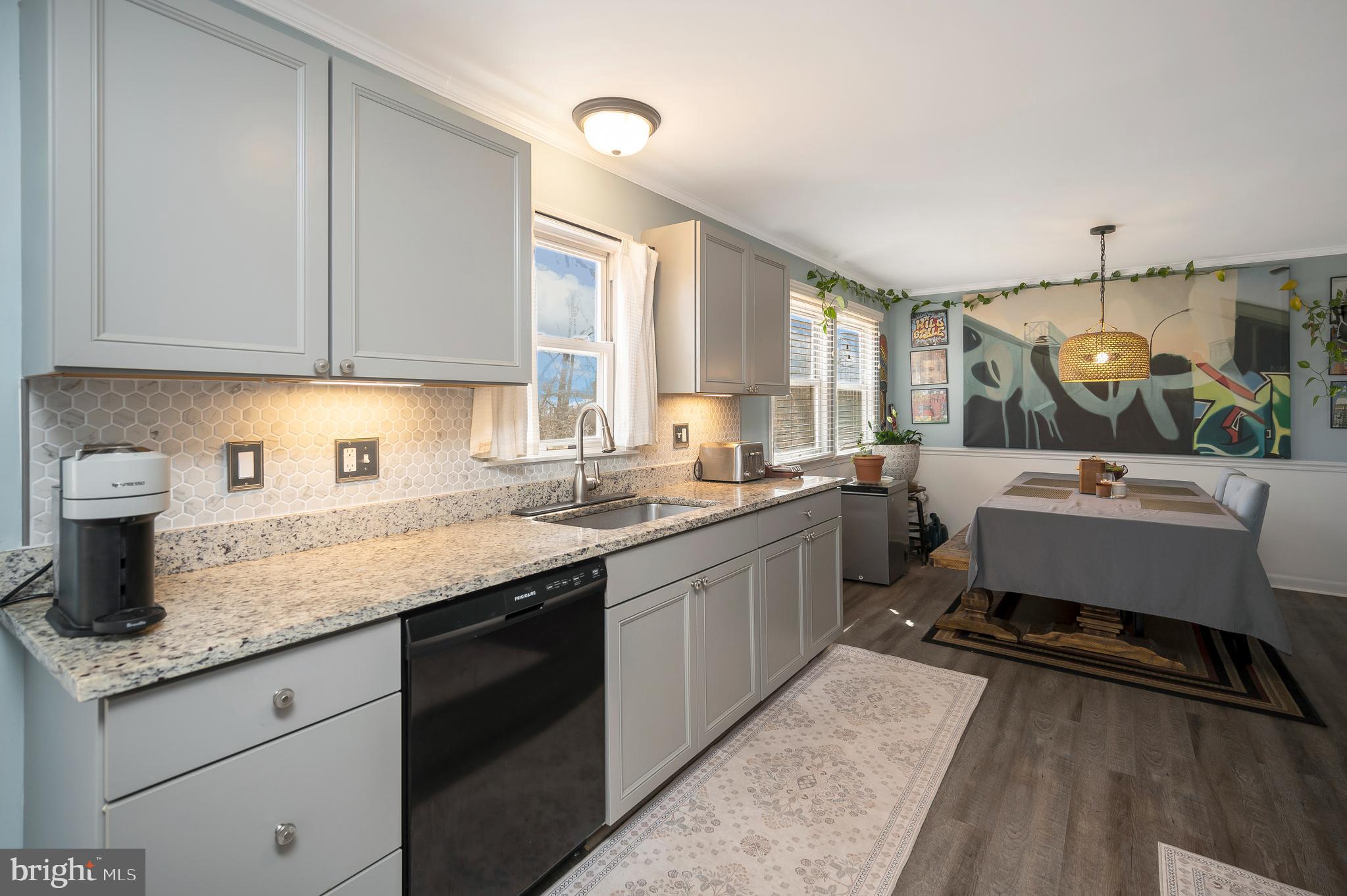 110 Doc Stone Road Stafford, VA 22556 - Photo 11 of 39 a kitchen with a sink a counter space appliances and cabinets