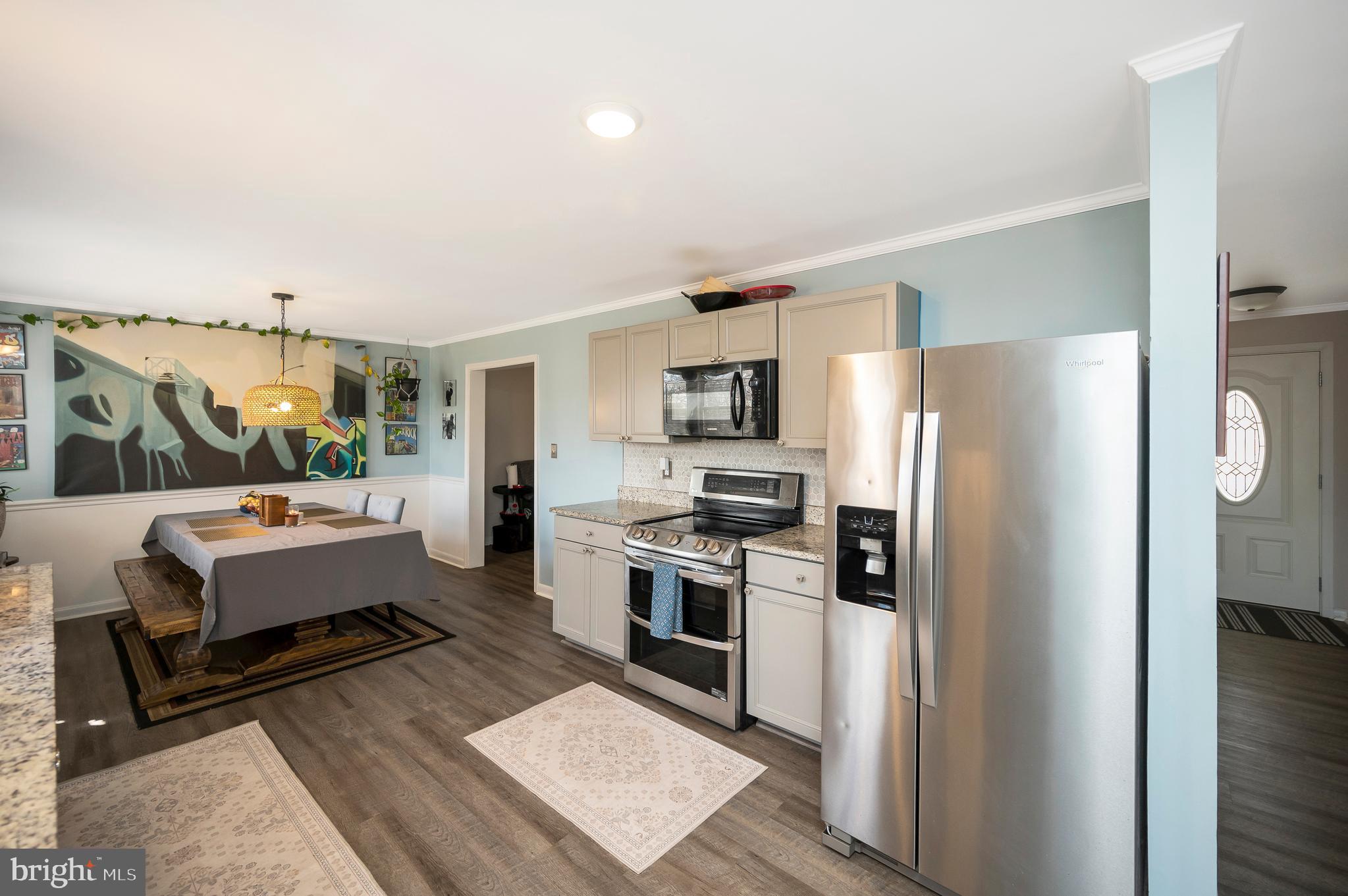 110 Doc Stone Road Stafford, VA 22556 - Photo 12 of 39 a kitchen with a refrigerator a stove top oven a sink and dishwasher