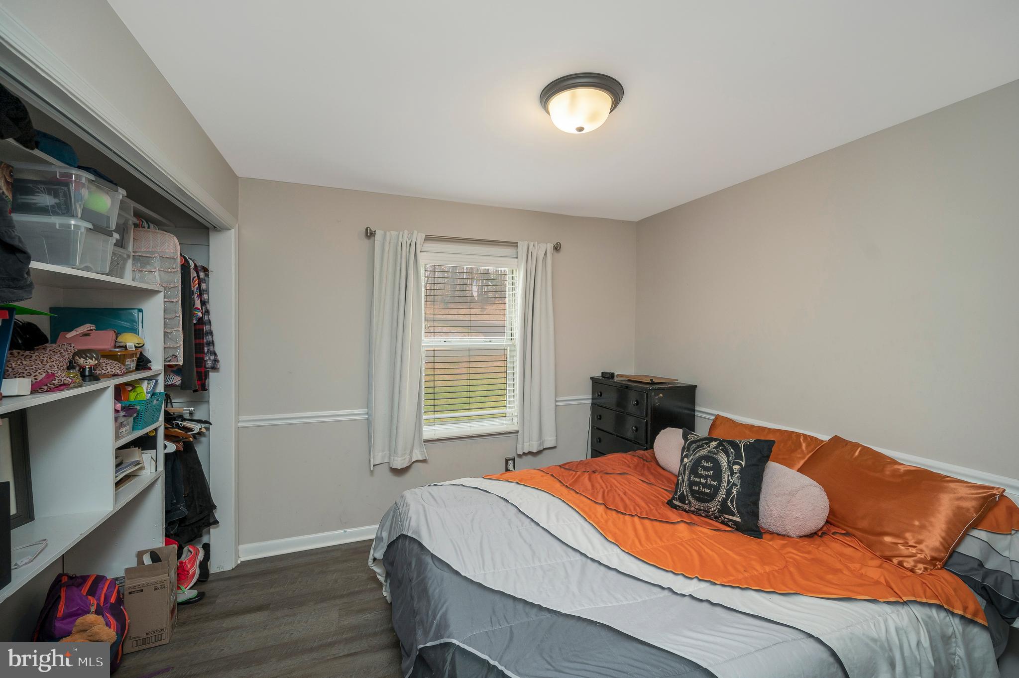 110 Doc Stone Road Stafford, VA 22556 - Photo 21 of 39 a bedroom with a bed and a window