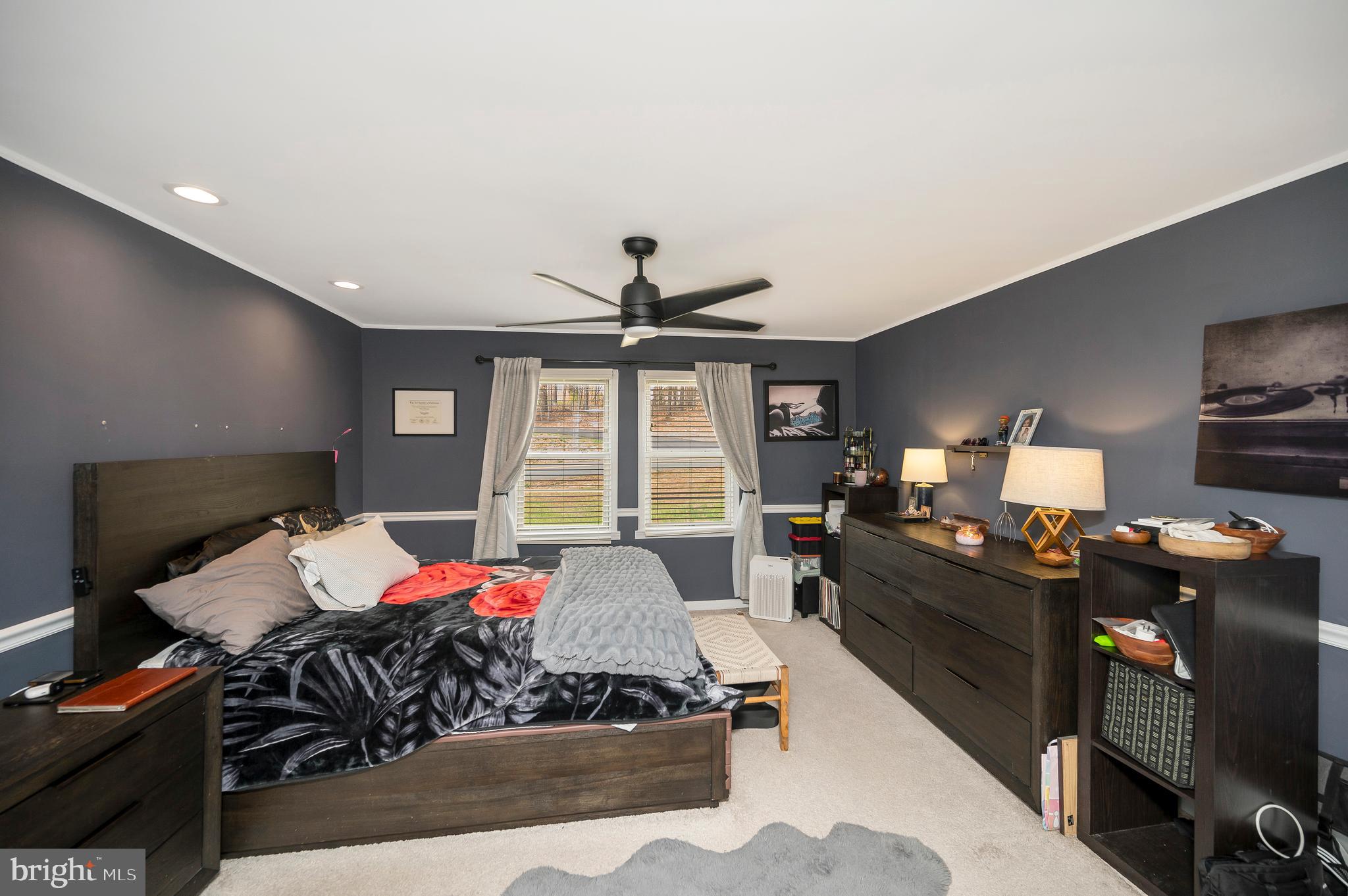 110 Doc Stone Road Stafford, VA 22556 - Photo 26 of 39 a bed room with furniture and a flat screen tv