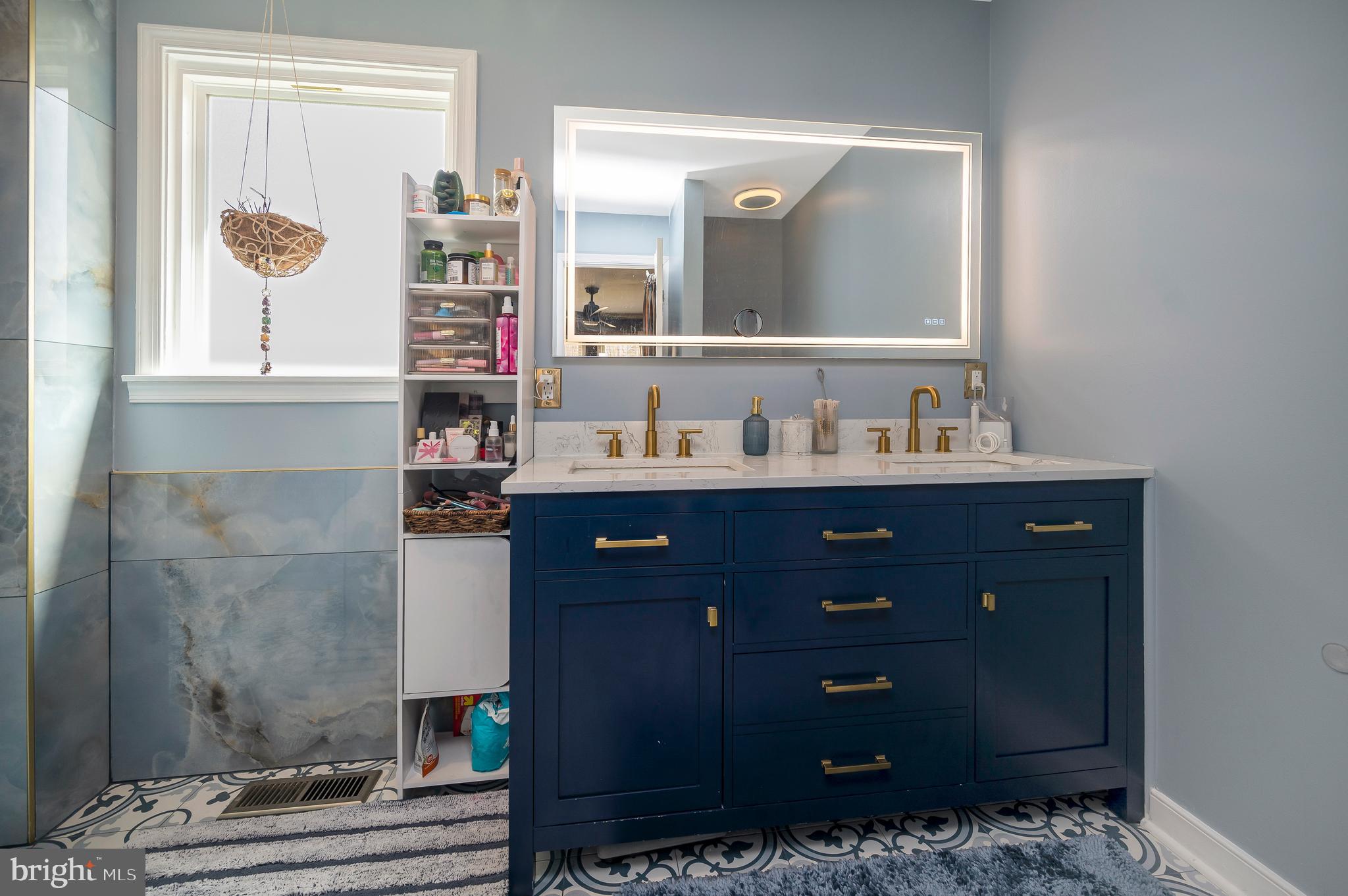 110 Doc Stone Road Stafford, VA 22556 - Photo 28 of 39 a bathroom with a sink vanity and mirror
