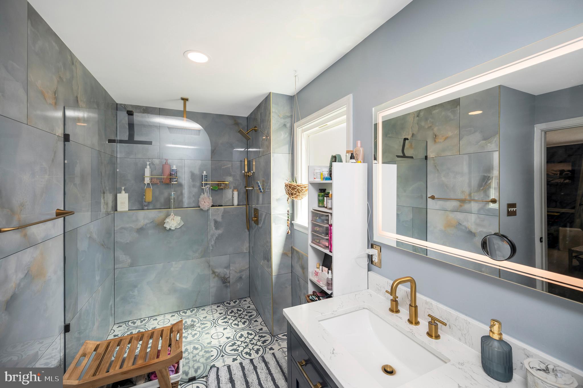 110 Doc Stone Road Stafford, VA 22556 - Photo 29 of 39 a bathroom with a sink and a shower