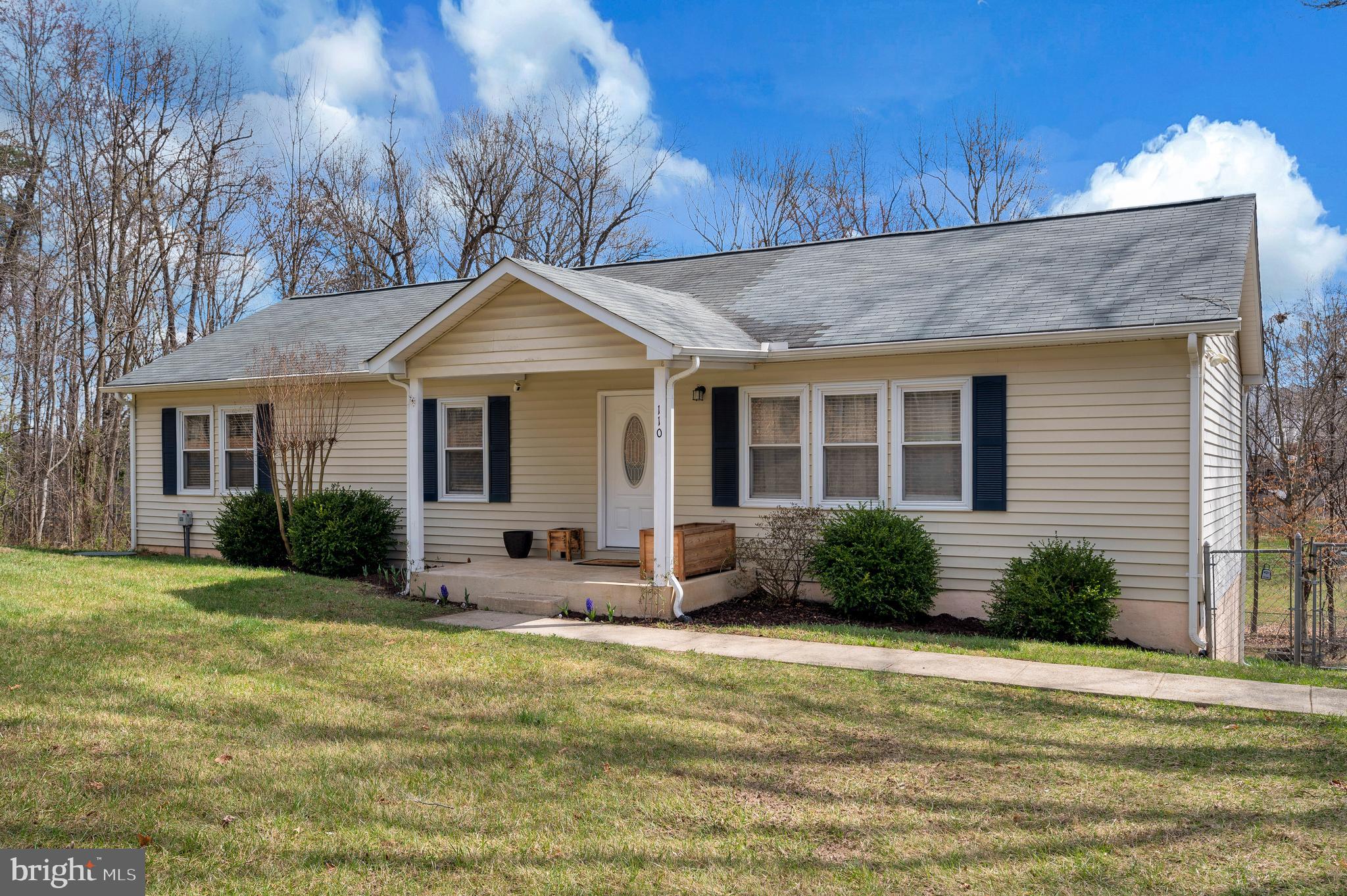 110 Doc Stone Road Stafford, VA 22556 - Photo 39 of 39 a front view of a house with a yard