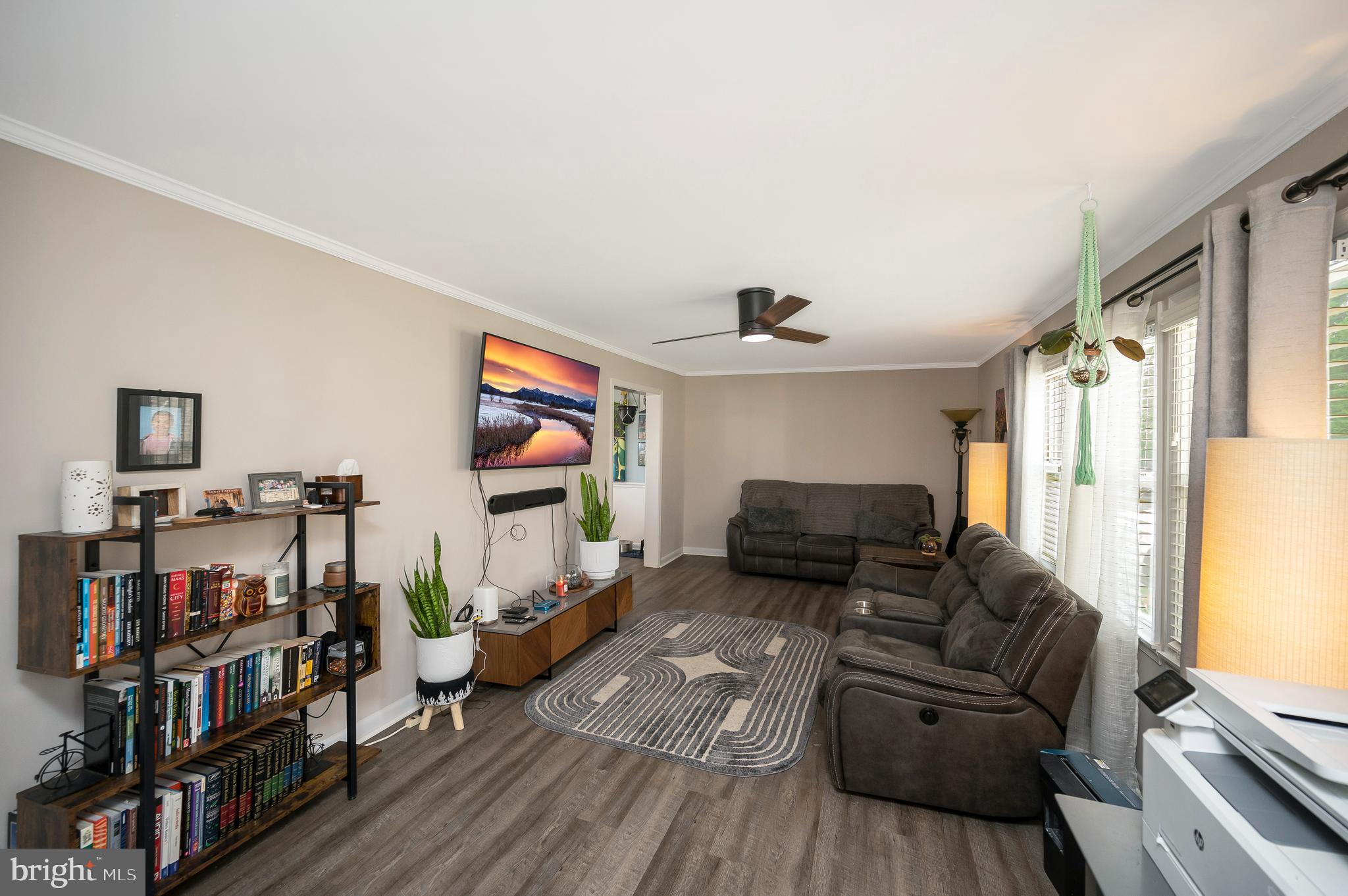 110 Doc Stone Road Stafford, VA 22556 - Photo 6 of 39 a living room with furniture and a flat screen tv