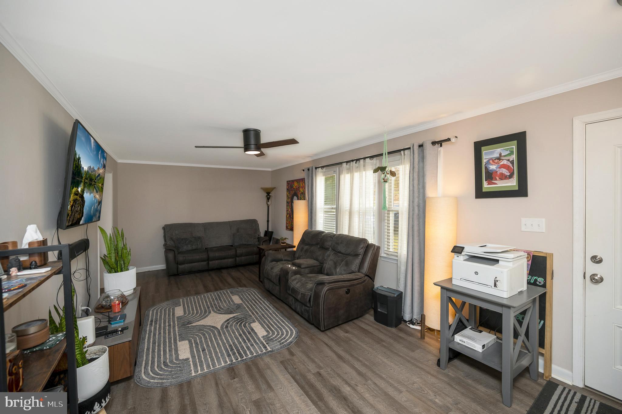110 Doc Stone Road Stafford, VA 22556 - Photo 7 of 39 a living room with furniture and a flat screen tv