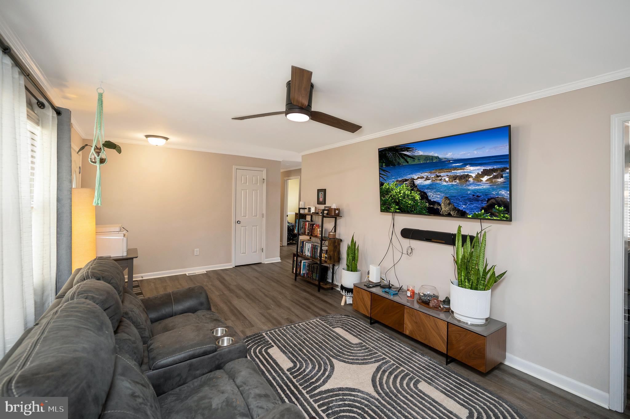 110 Doc Stone Road Stafford, VA 22556 - Photo 9 of 39 a living room with furniture and a flat screen tv