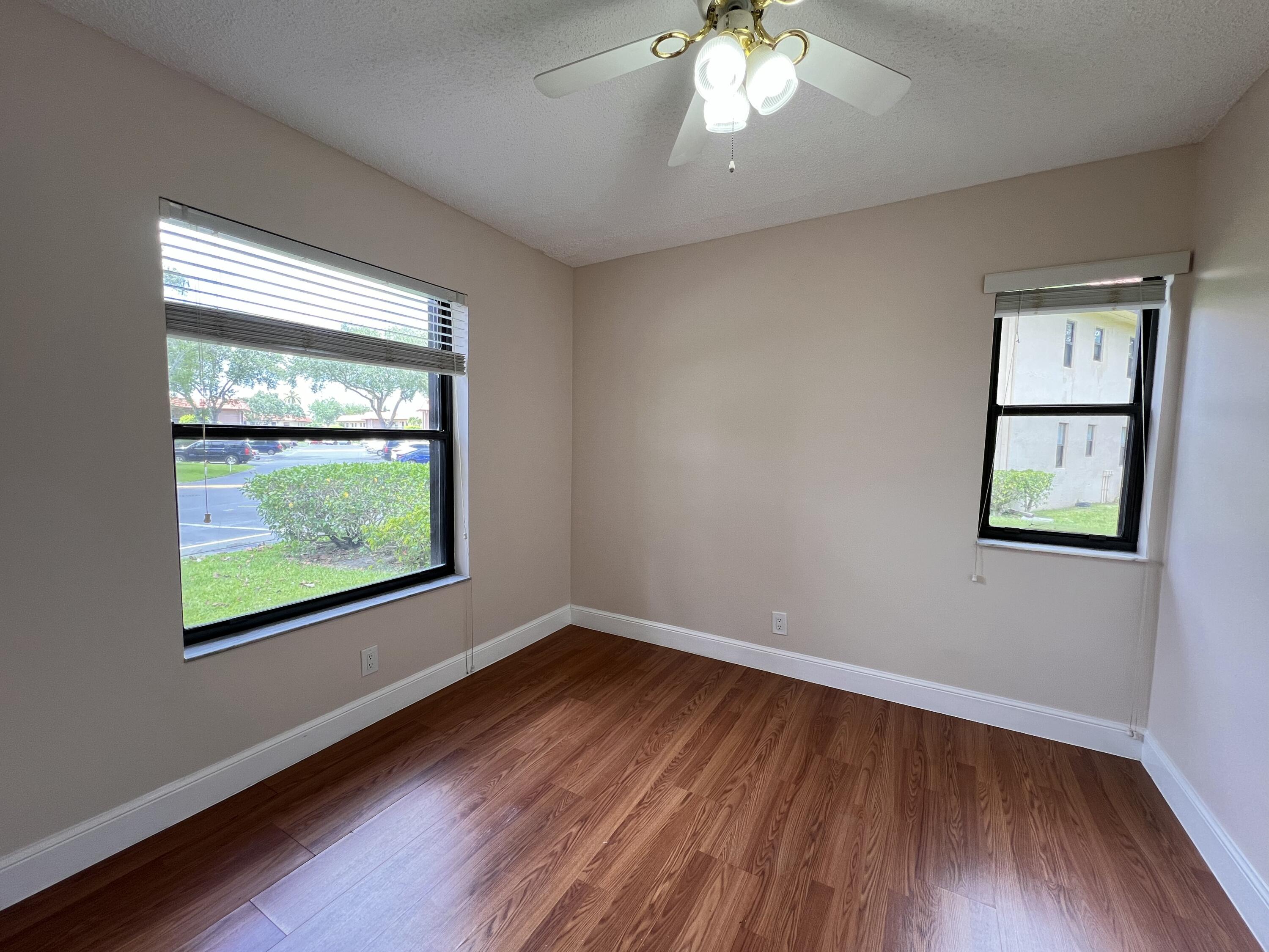 21890 Lake Forest Circle, Unit 101 Boca Raton, FL 33433 - Photo 16 of 55 Fan + light fixture