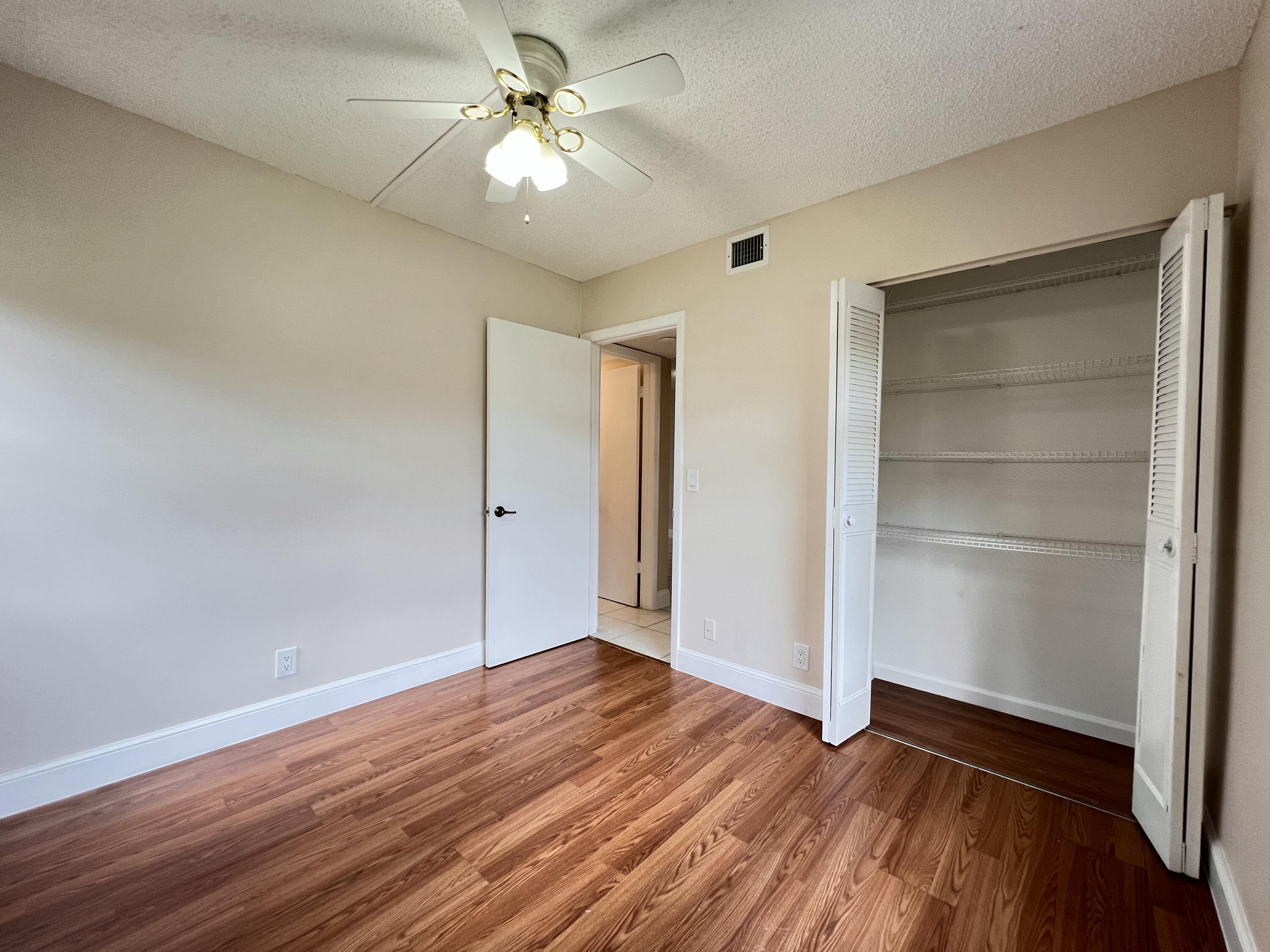 21890 Lake Forest Circle, Unit 101 Boca Raton, FL 33433 - Photo 17 of 55 Closet space in 2nd bedroom