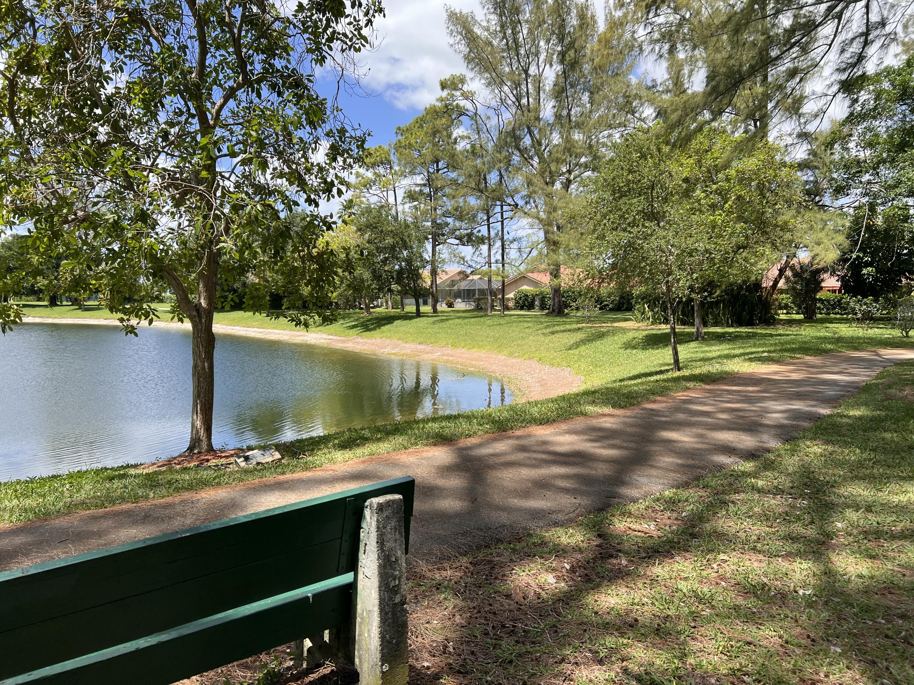 21890 Lake Forest Circle, Unit 101 Boca Raton, FL 33433 - Photo 45 of 55 Lake with wrap around trail