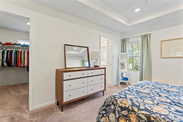 a view of a workspace with furniture and wooden floor