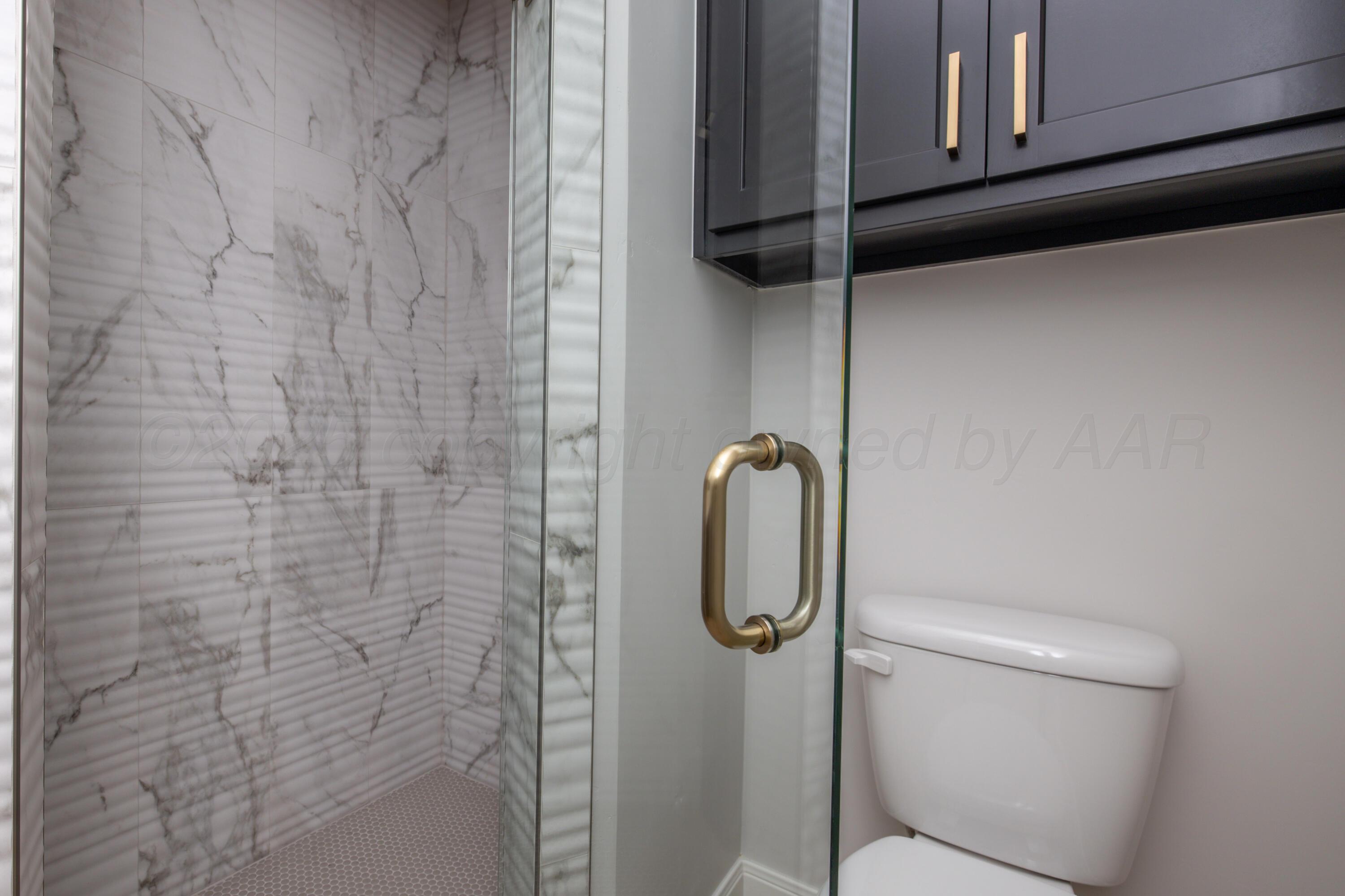 10250 Prickly Pear Road Amarillo, TX 79119 - Photo 24 of 41 a bathroom with a shower and toilet
