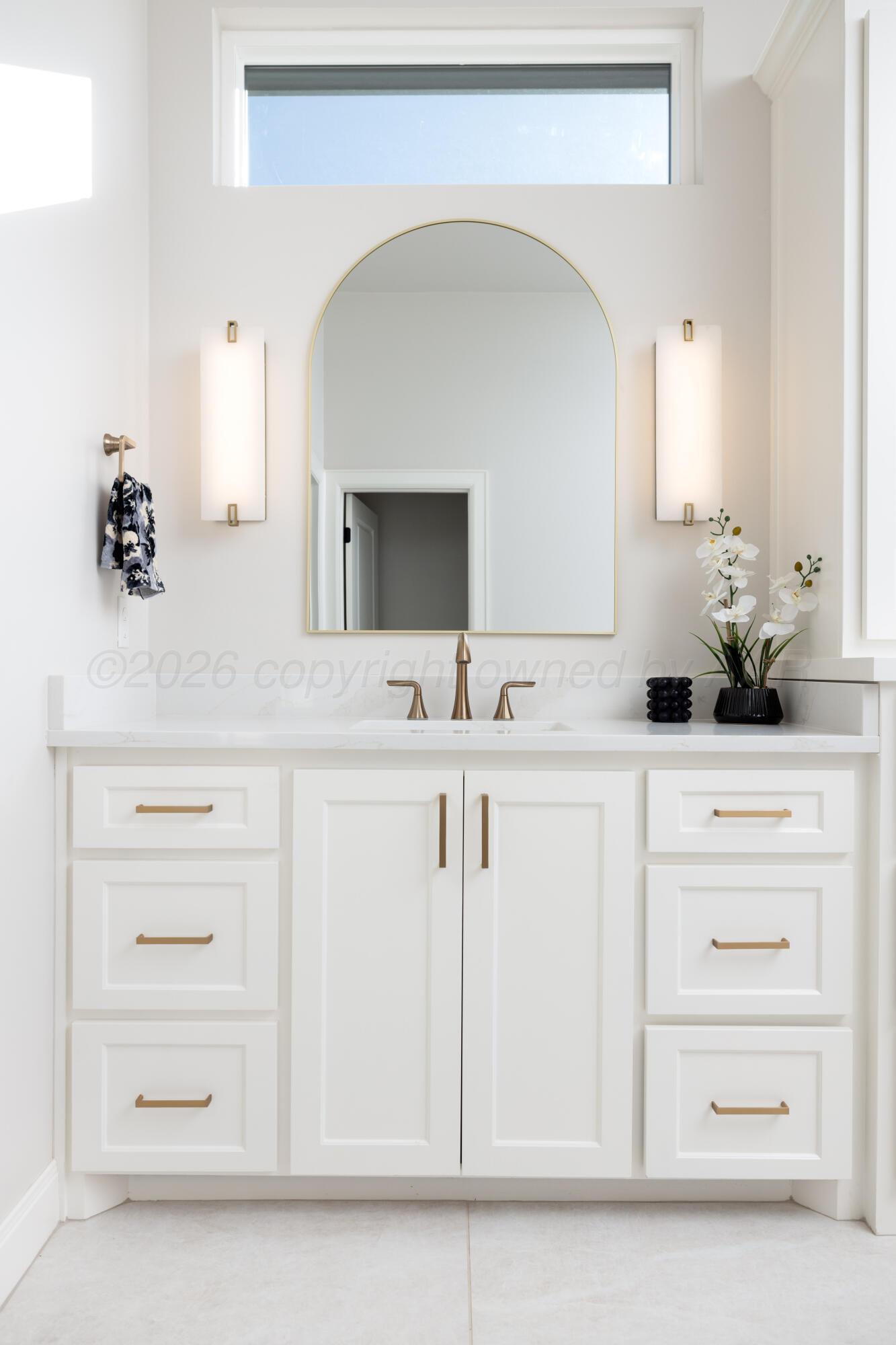 10250 Prickly Pear Road Amarillo, TX 79119 - Photo 29 of 41 a bathroom with a sink vanity and mirror