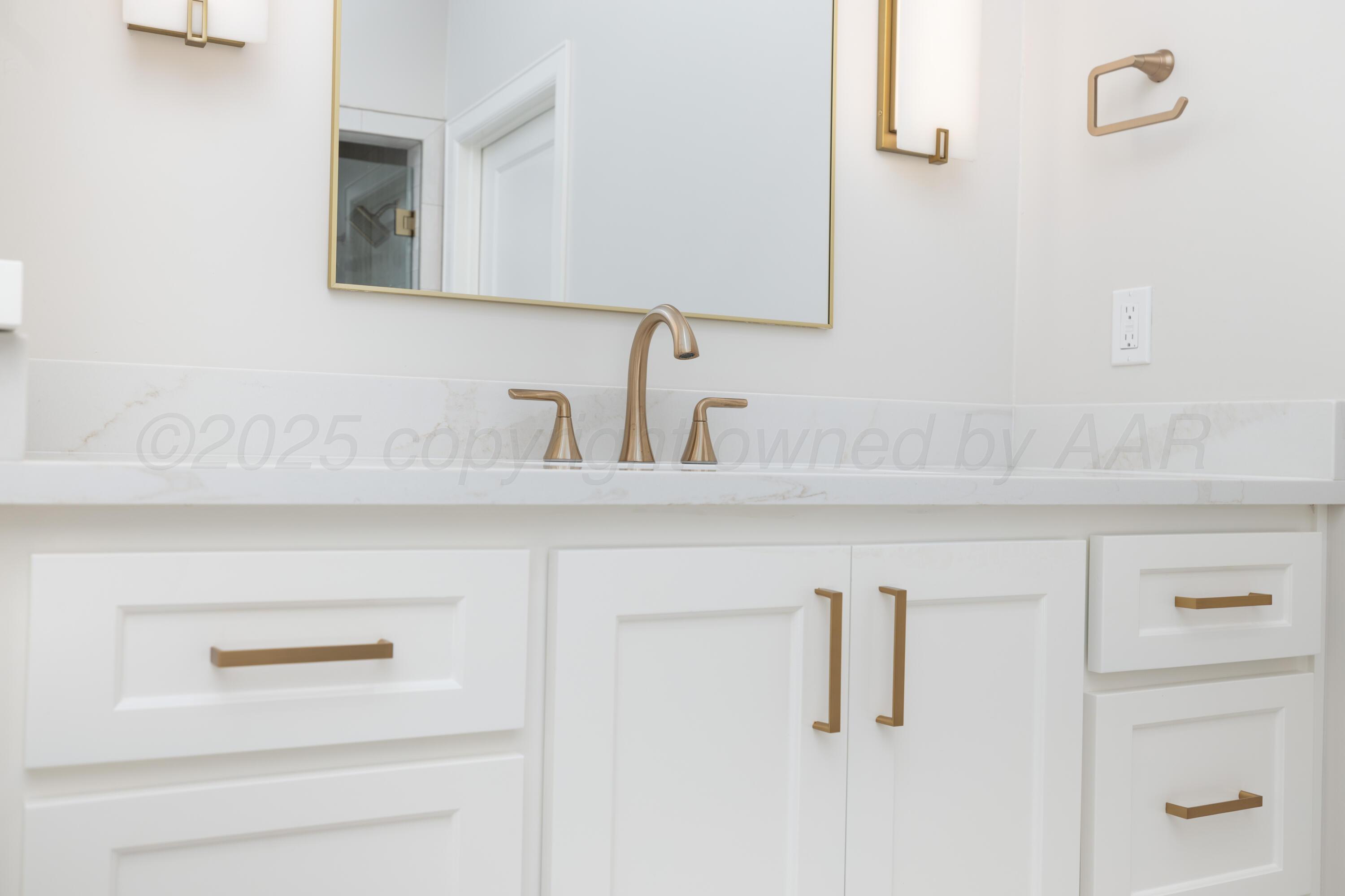 10250 Prickly Pear Road Amarillo, TX 79119 - Photo 32 of 41 a bathroom with a sink and vanity