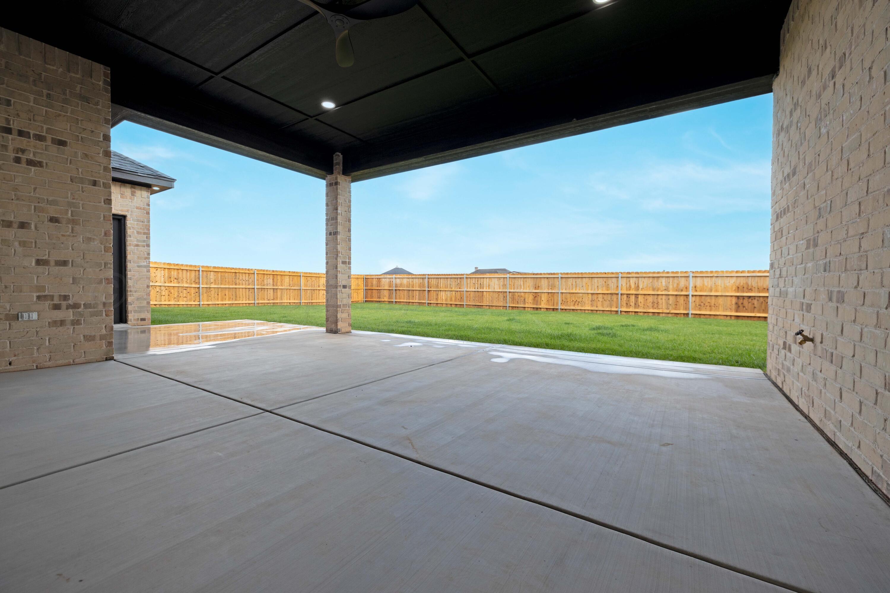 10250 Prickly Pear Road Amarillo, TX 79119 - Photo 40 of 41 a view of an empty room with a windows and yard