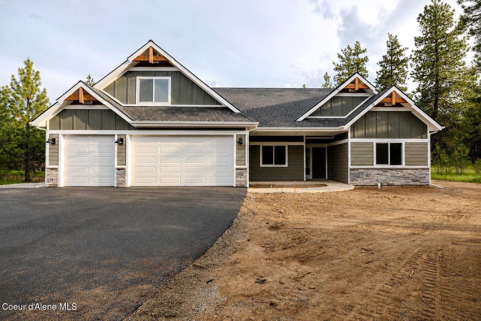 12664 East Howard Road Athol, ID 83801 - Photo 1 of 40 Front of Home