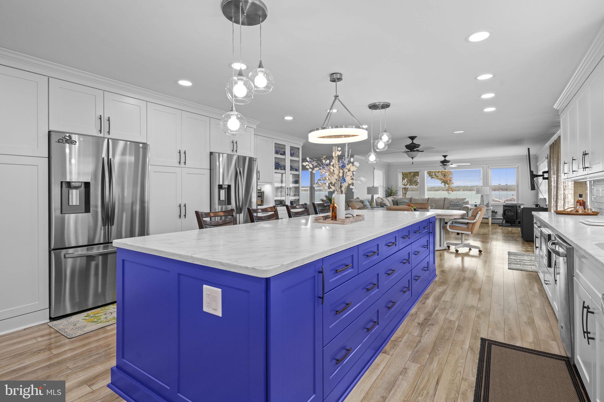 17432 Rock Point Road Newburg, MD 20664 - Photo 12 of 55 a kitchen with stainless steel appliances a sink stove and refrigerator