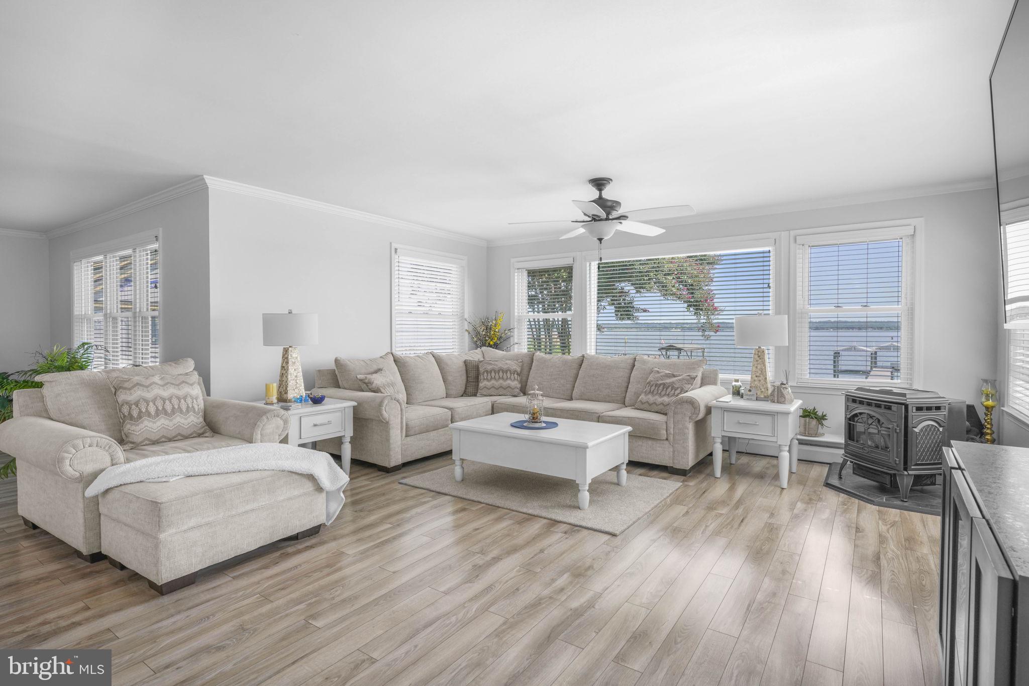 17432 Rock Point Road Newburg, MD 20664 - Photo 18 of 55 a living room with furniture and wooden floor