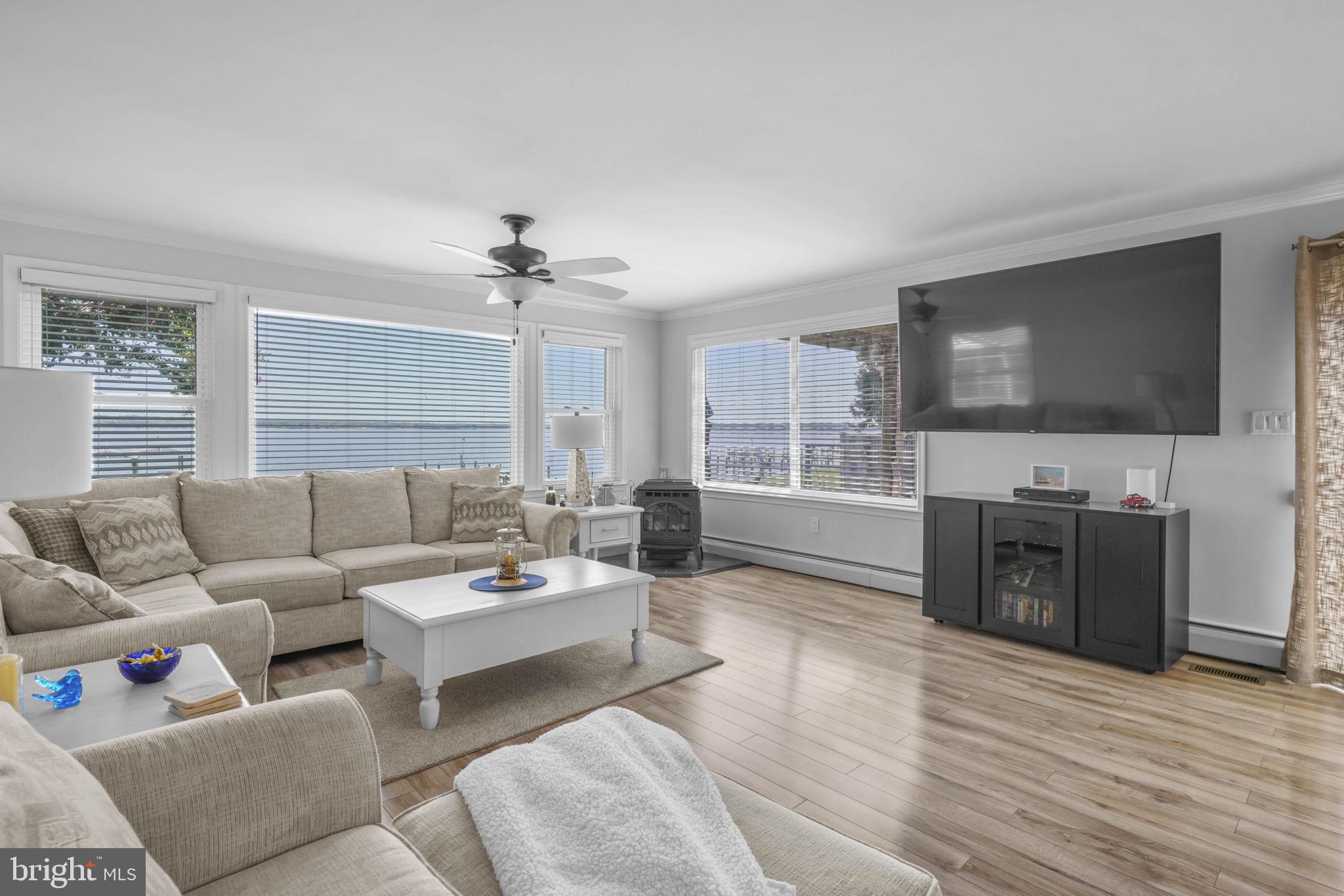 17432 Rock Point Road Newburg, MD 20664 - Photo 19 of 55 a living room with furniture and a flat screen tv