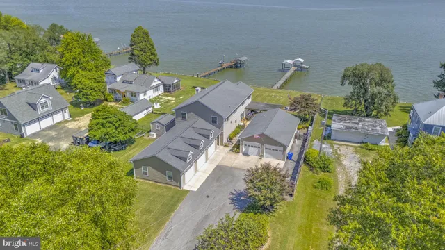 an aerial view of a house with a garden