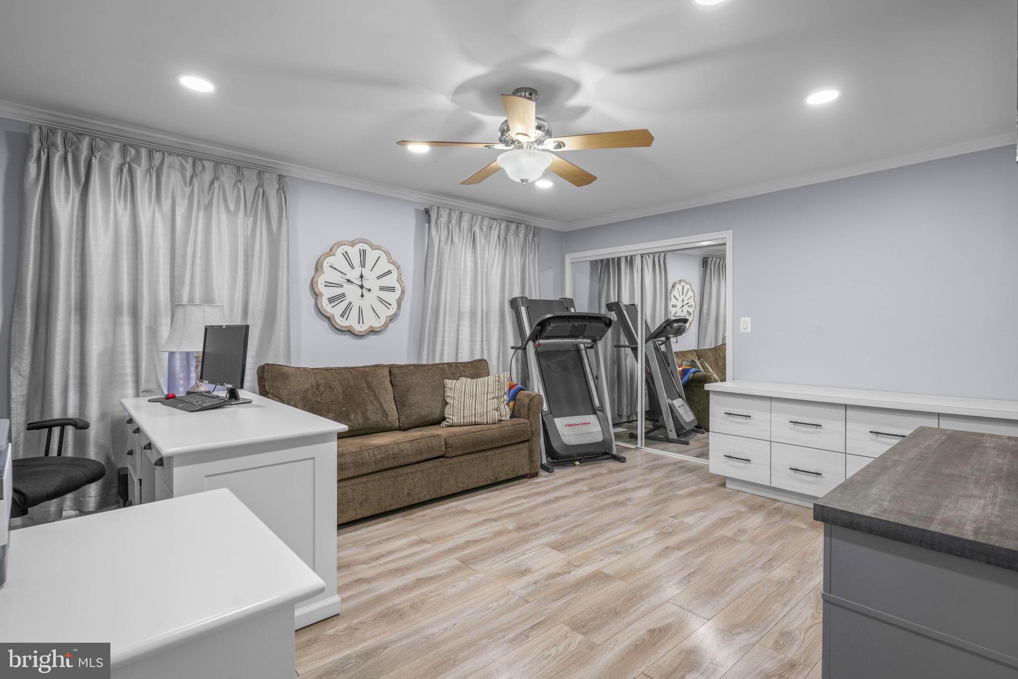 17432 Rock Point Road Newburg, MD 20664 - Photo 22 of 55 a living room with furniture and a flat screen tv