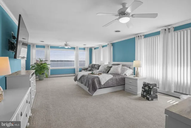 a bedroom with bed and a window