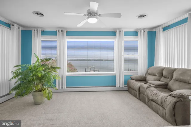 a spacious bedroom with a bed and a couch