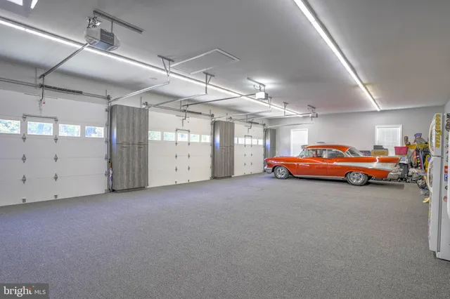 a view of a lake with houses in the back