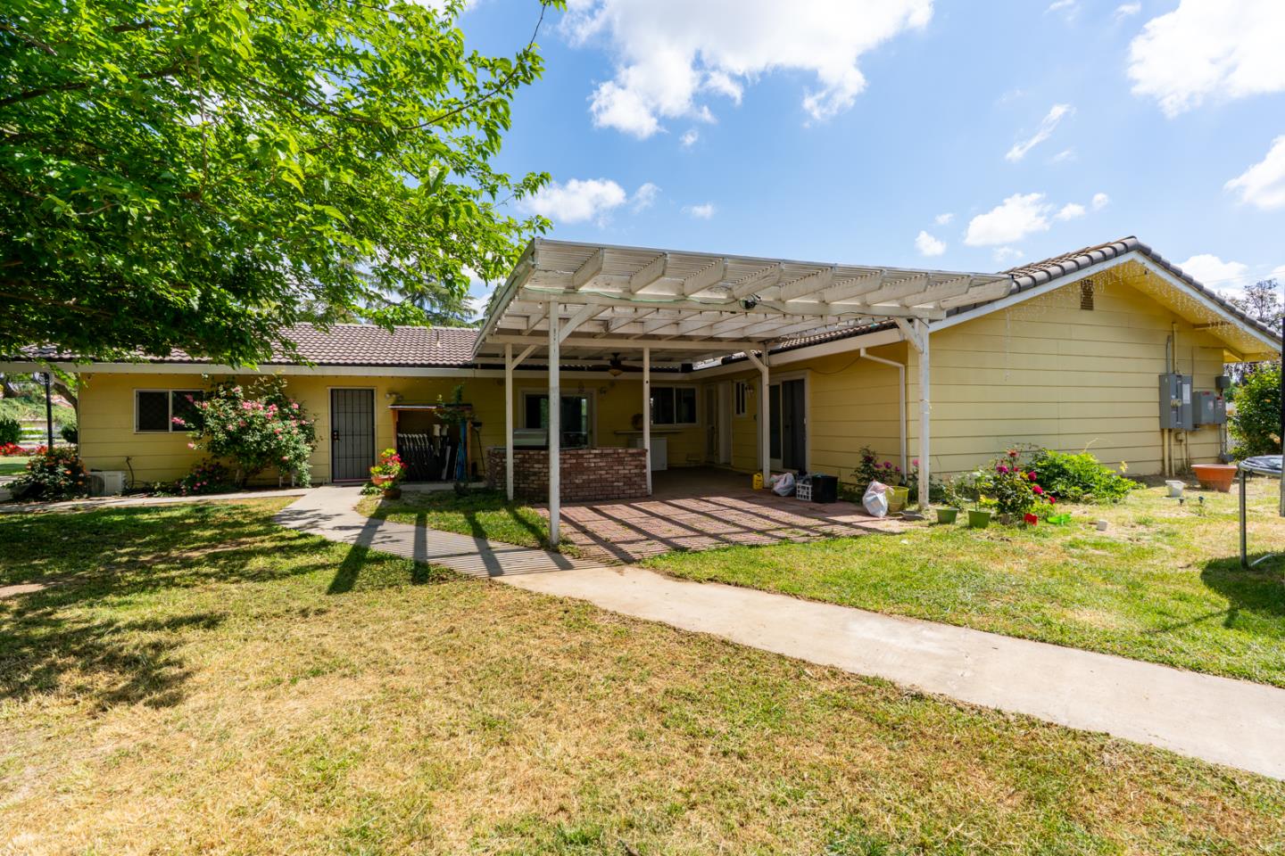 2965 Dunn Road Merced, CA 95340 - Photo 16 of 68 a view of a house with backyard porch and sitting area