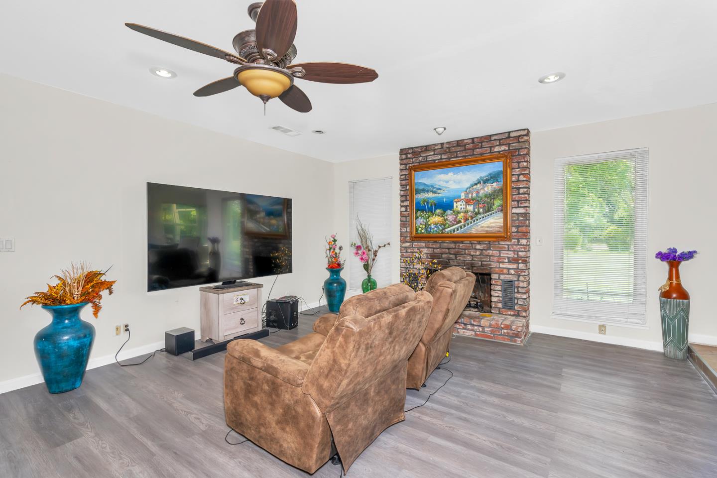2965 Dunn Road Merced, CA 95340 - Photo 20 of 68 a living room with furniture flat screen tv and a large window
