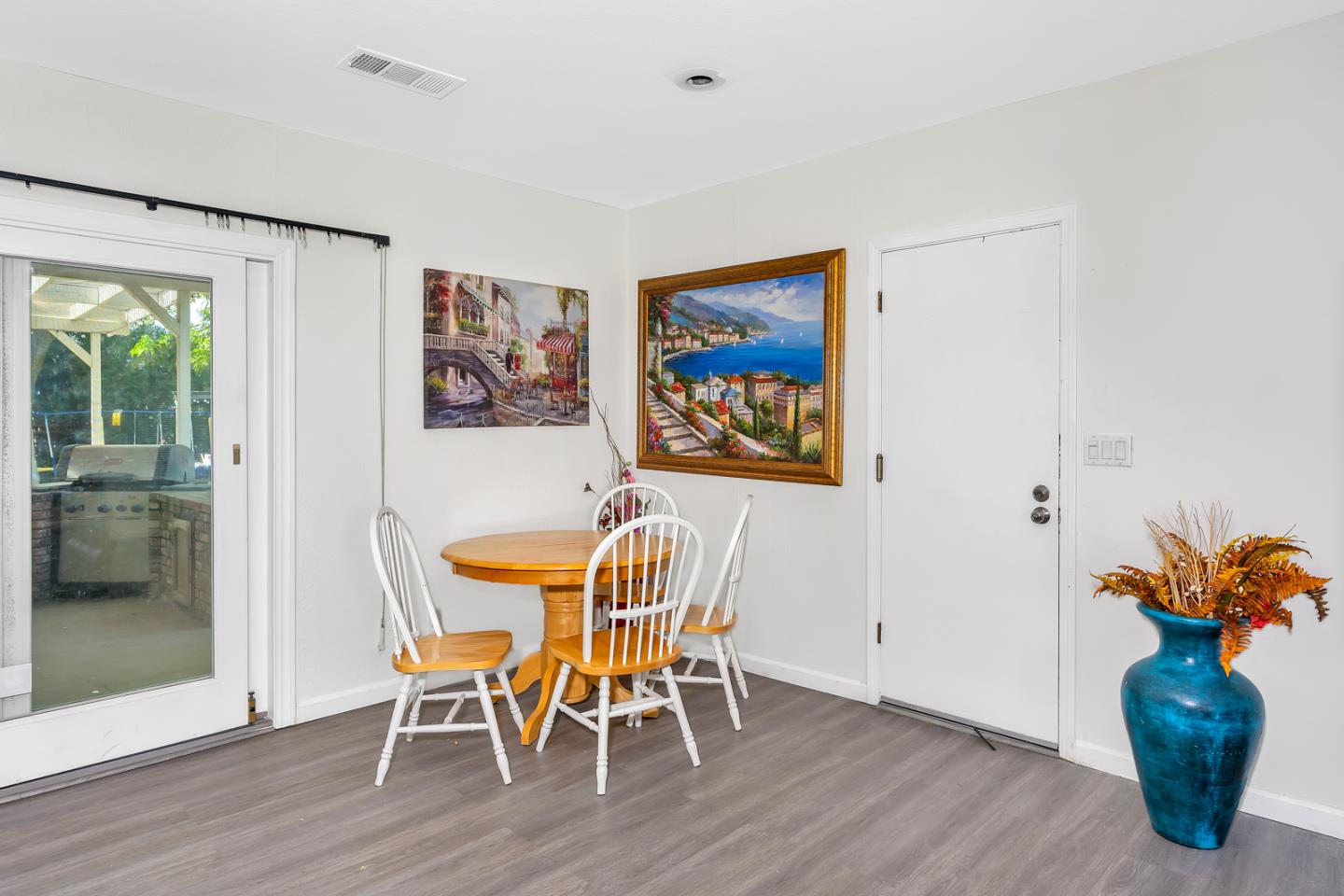 2965 Dunn Road Merced, CA 95340 - Photo 22 of 68 a view of a dining room with furniture window and wooden floor