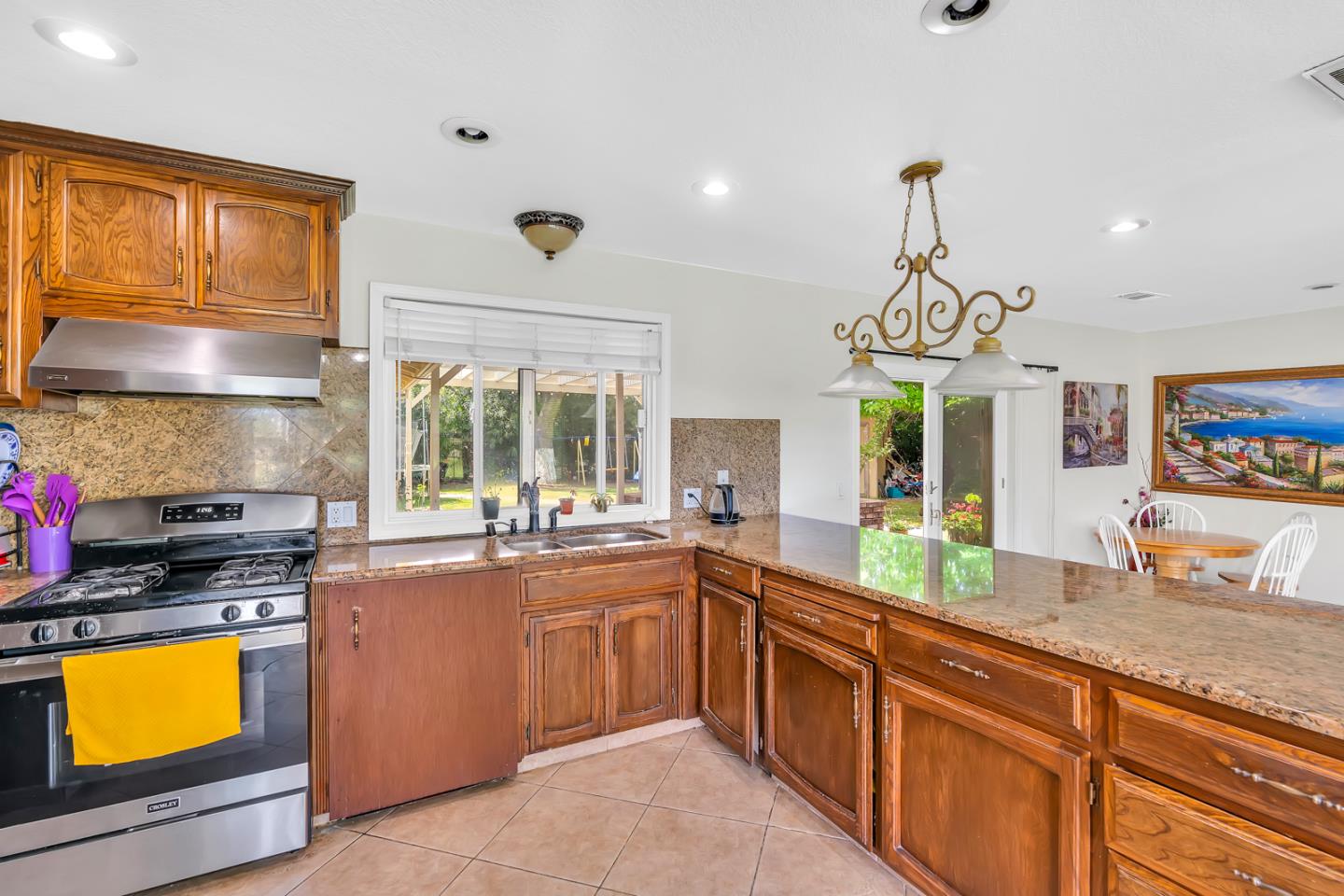2965 Dunn Road Merced, CA 95340 - Photo 25 of 68 a kitchen with a sink stove and microwave