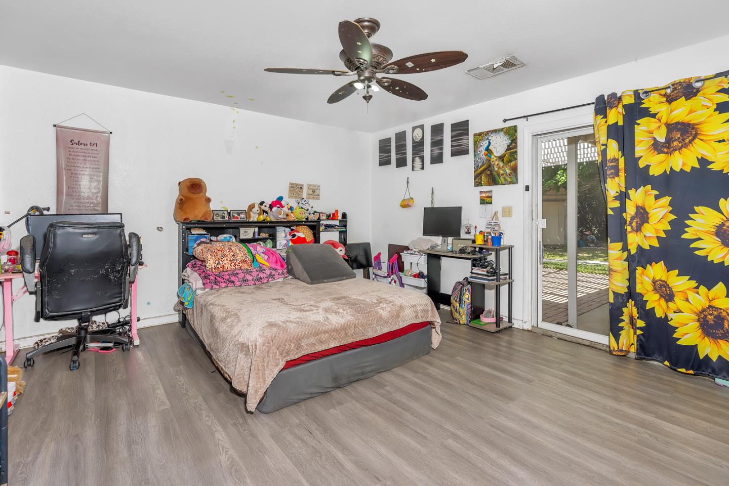 2965 Dunn Road Merced, CA 95340 - Photo 33 of 68 a bed room with a bed and a chair