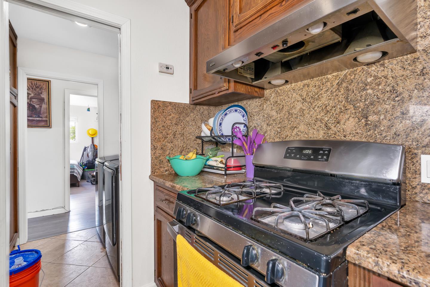 2965 Dunn Road Merced, CA 95340 - Photo 37 of 68 a stove top oven sitting inside of a kitchen