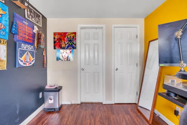 a view of a park with trees and plants