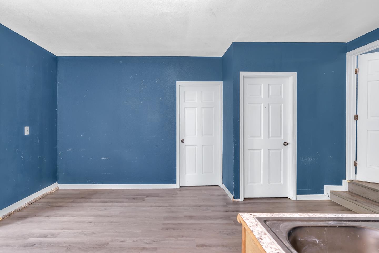 2965 Dunn Road Merced, CA 95340 - Photo 53 of 68 a view of a livingroom with wooden floor and staircase